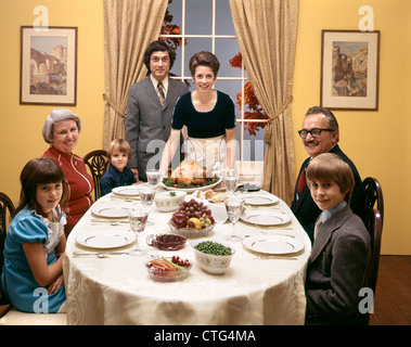 1970s 3 GENERATION FAMILY TURKEY DINNER Stock Photo