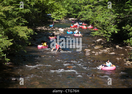 Families tubing down river in North Carolina Stock Photo