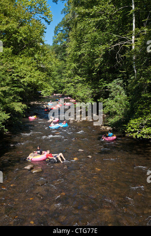 Families tubing down river in North Carolina Stock Photo