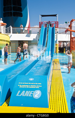 Children playing on water slide on the Carnival Fascination cruise ship Stock Photo