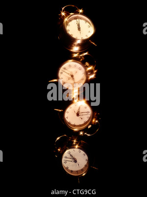 FALLING ALARM CLOCKS Stock Photo