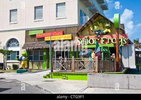 Tourists going to Senor Frog's souvenir shop in Nassau, Bahamas Stock Photo