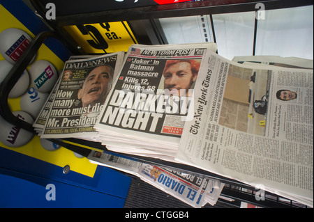 New York daily newspapers report on the mass shooting in a theater in Aurora, Colorado Stock Photo