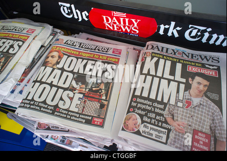 New York daily newspapers report on the mass shooting in a theater in Aurora, Colorado Stock Photo