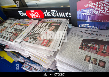 New York daily newspapers report on the mass shooting in a theater in Aurora, Colorado Stock Photo