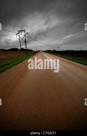 Wet country road after a storm. Stock Photo