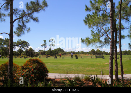 Port St.Saint Lucie Florida,PGA Village,golf course driving range,golfer,practicing,man men male adult adults,leisure sport,swing,club,visitors travel Stock Photo