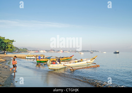 fishing boats on beach in dili east timor, timor leste Stock Photo