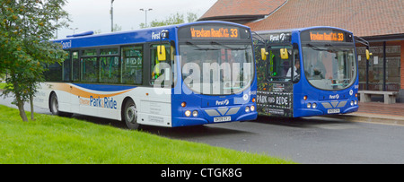 Two Park & Ride single deck buses at car park area on outskirts of Chester all run into City by Cheshire West & Chester Council Cheshire England UK Stock Photo