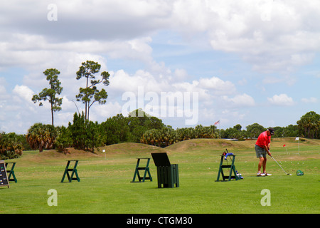 Port St.Saint Lucie Florida,PGA Village,golf course driving range,golfer,practicing,active,senior seniors old older citizen citizens pensioner pension Stock Photo