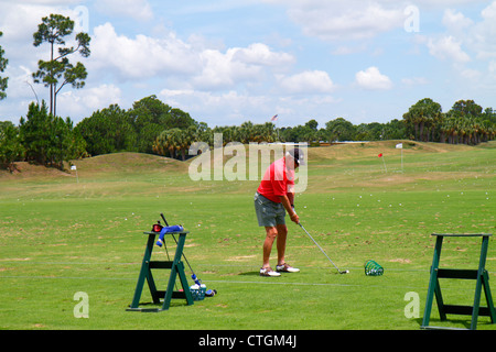 Port St.Saint Lucie Florida,PGA Village,golf course driving range,golfer,practicing,active,senior seniors old older citizen citizens pensioner pension Stock Photo
