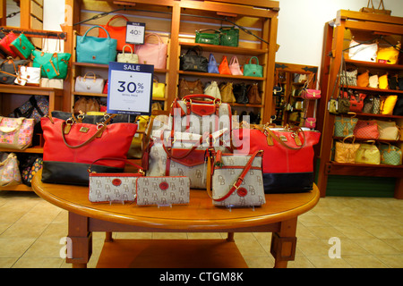 Vero Beach Florida,Vero Beach Outlets,Dooney & and Bourke,women's,handbag  handbags purse purses pocketbook pocketbooks,purses,sign,logo,30% discount  o Stock Photo - Alamy