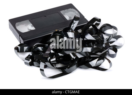 VHS video cassette with tangled video tape isolated on white Stock Photo
