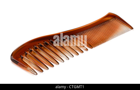 Brown plastic hair comb isolated on white Stock Photo