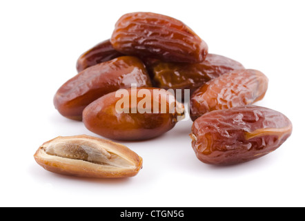 Heap of dried date fruit isolated on white Stock Photo