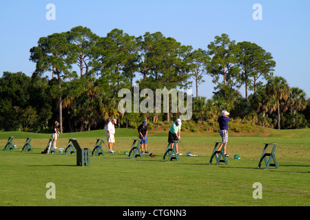 Port St.Saint Lucie Florida,PGA Village,golf course driving range,golfer,practicing,active,senior seniors old older citizen citizens pensioner pension Stock Photo