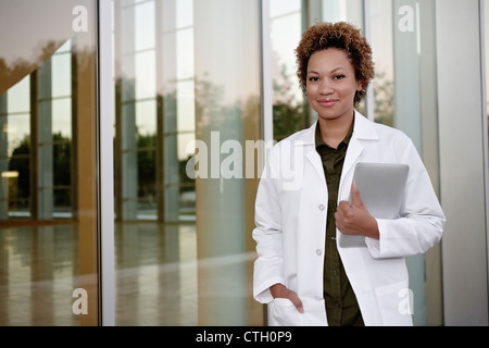 Doctor holding digital tablet Stock Photo
