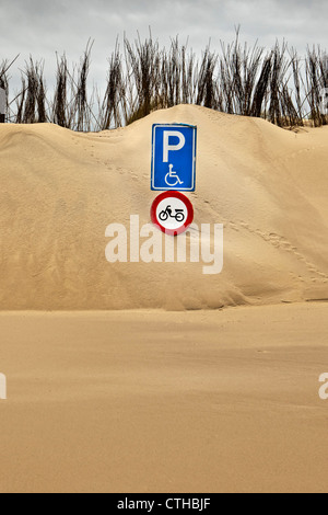 The Netherlands, Kamperland, Parking place at beach covered with sand. sign Stock Photo