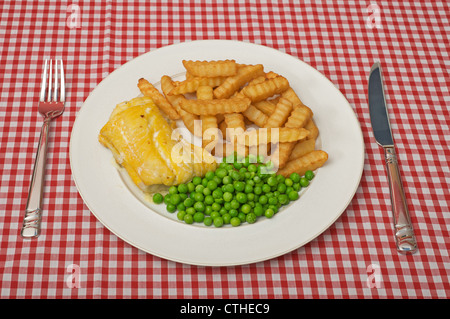 Smoked Haddock, chips and peas Stock Photo