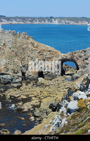 The rock formation and natural arch due to water erosion château de Dinan at the Pointe de Dinan, Finistère, Brittany, France Stock Photo