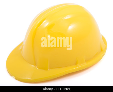 This is a miniature yellow hard hat shot on white background Stock Photo