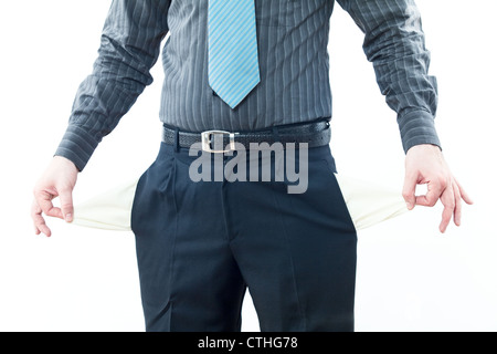 Bankrupt business person with empty pockets Stock Photo