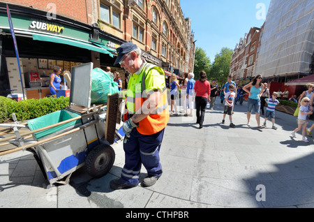 London council street cleaning services dust cart and street sweeper