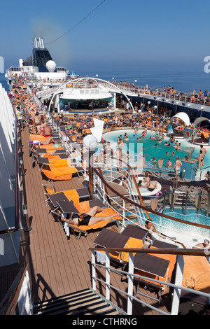 Swimming pool areas on Italian Cruise Ship MSC Musica Stock Photo - Alamy