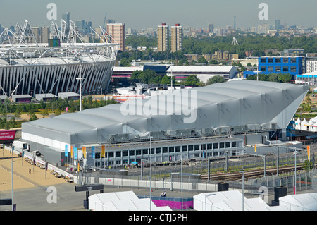 Aerial view looking down from above Olympic Park water polo venue located middle & part of main London 2012 stadium left Stratford London England UK Stock Photo