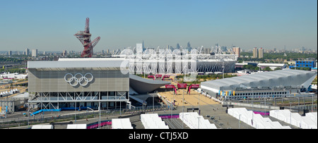 Looking down on Olympic Park aquatic centre & orbit tower left, main stadium middle, water polo right & city of London skyline distant Stratford UK Stock Photo