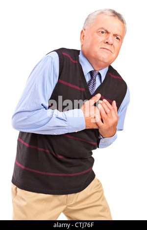 Mature man having a heart attack, isolated on white background Stock Photo
