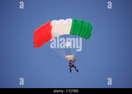 Skydiver againt blue sky Stock Photo