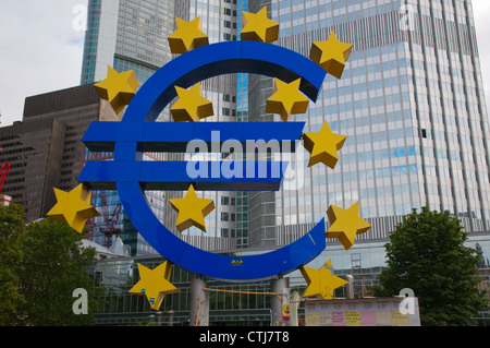 Euro sign in front of EuroTower building Frankfurt am Main city state of Hesse Germany Europe Stock Photo
