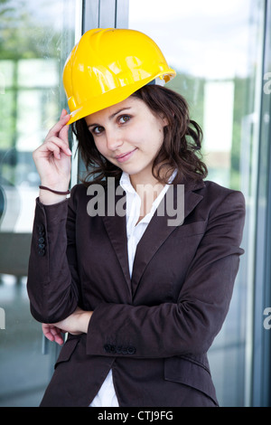 Young female construction engineer with phone Stock Photo