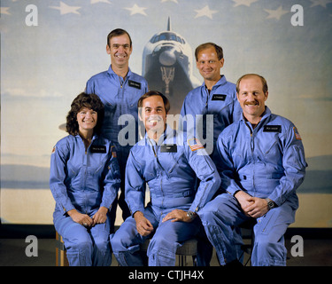 Astronauts of the STS-7 Space Shuttle Challenger mission are left to right first row: Sally Ride, Robert Crippen, Frederick Hauck; rear row: John Fabian and Norman Thagard. STS-7 launched the first five-member crew and the first American female astronaut into space on June 18, 1983. Stock Photo