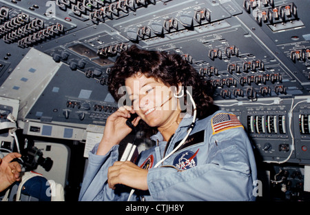 NASA astronaut Sally Ride on the flight deck of the space shuttle Challenger during an earth orbit mission June 18, 1983. Rid became the first American woman in space on June 18, 1983. Stock Photo