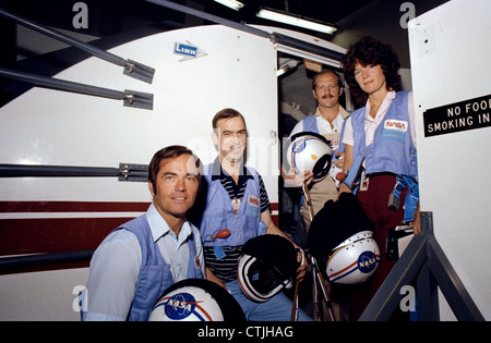 NASA astronaut crew of the NASA STS-7 crew take a break from simulations in the Johnson Space Center’s Mission May 23, 1983. (L to R) Robert L. Crippen, John M. Fabian, Frederick H. Hauck and Sally K. Ride. Stock Photo