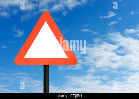 Red blank triangular road sign and blue sky Stock Photo