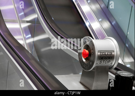 Emergency stop button on escalators in a London railway station, England. Stock Photo