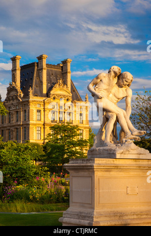 Good Samaritan Statue in Jardin des Tuileries with Pavillon de Flore of the Musee du Louvre beyond, Paris, France Stock Photo