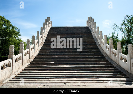 A arch bridge against blue sky  in Summer Palace Stock Photo