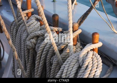 Ropes on a wooded tall ship sailing boat for the sail Stock Photo