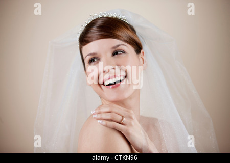 A young bride looking over her shoulder Stock Photo