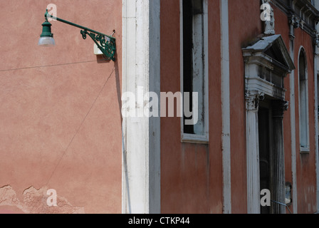 Beautiful facade detail of typical ancient house in Venice, Italy Stock Photo