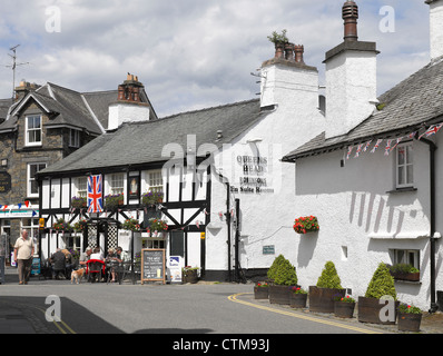 Queens Head Inn village pub in summer Hawkshead Village Lake District Cumbria England UK United Kingdom GB Great Britain Stock Photo