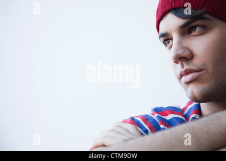Thoughtful young man isolated on white background Stock Photo
