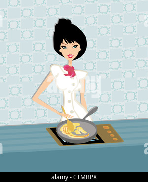 Beautiful lady cooking in the kitchen Stock Photo - Alamy