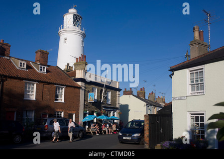 The Sole Bay Inn beneath the famous lighthouse landmark at the Suffolk seaside town of Southwold, Suffolk. Stock Photo