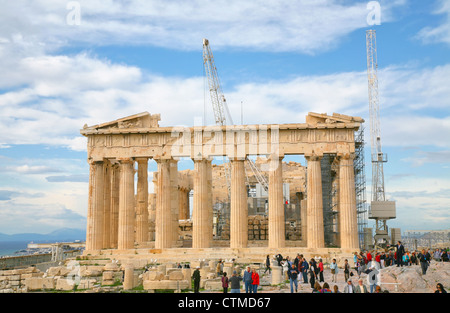Hundreds of tourists mill around the Parthenon in Athens, Greece during its continued restoration. Stock Photo