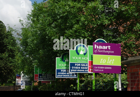 Multiple for sale and to let signs outside a block of flats in Northampton Stock Photo